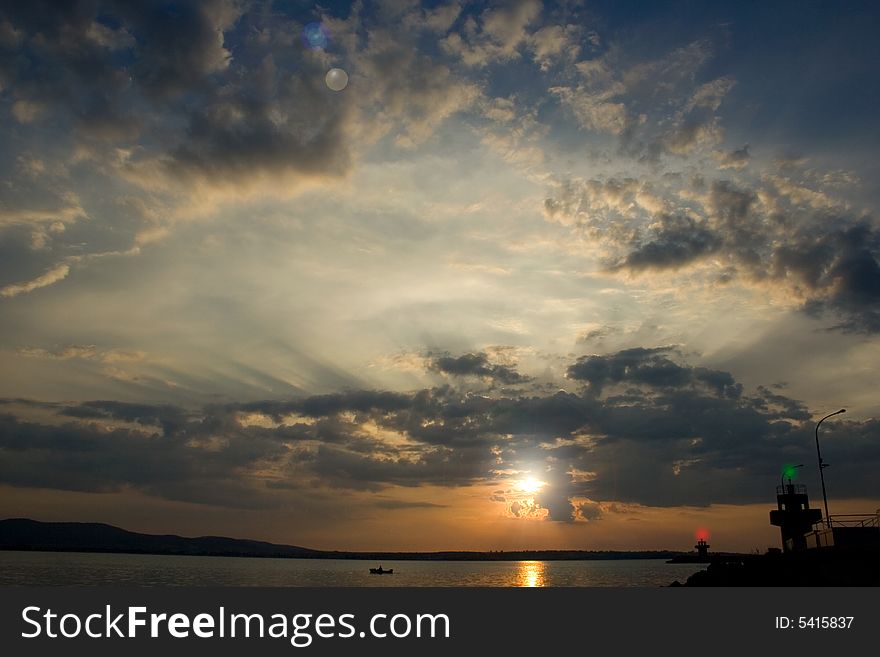 Red Sky.Black sea-Bulgaria-2008 It starts the new day. The sun punctures a road for itself in its oort clouds.Calo.The Bulgarian Black Sea Coast covers the whole eastern border of Bulgaria.