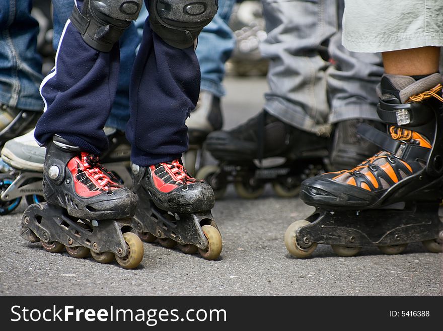 Children with the roller skates. Children with the roller skates