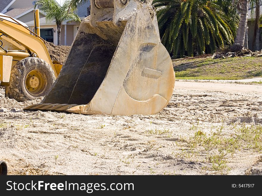 The shovel or scoop from a large backhoe