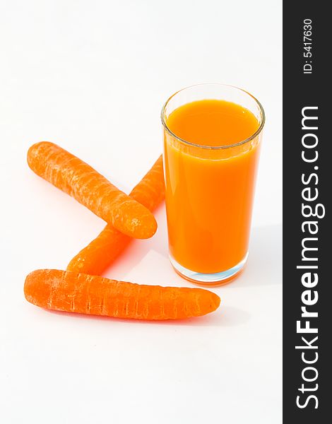 Carrots and carrot juice isolated on white