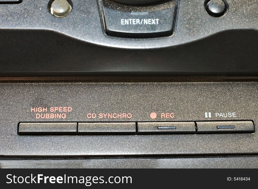 Detail of a stereo tape recorder's buttons