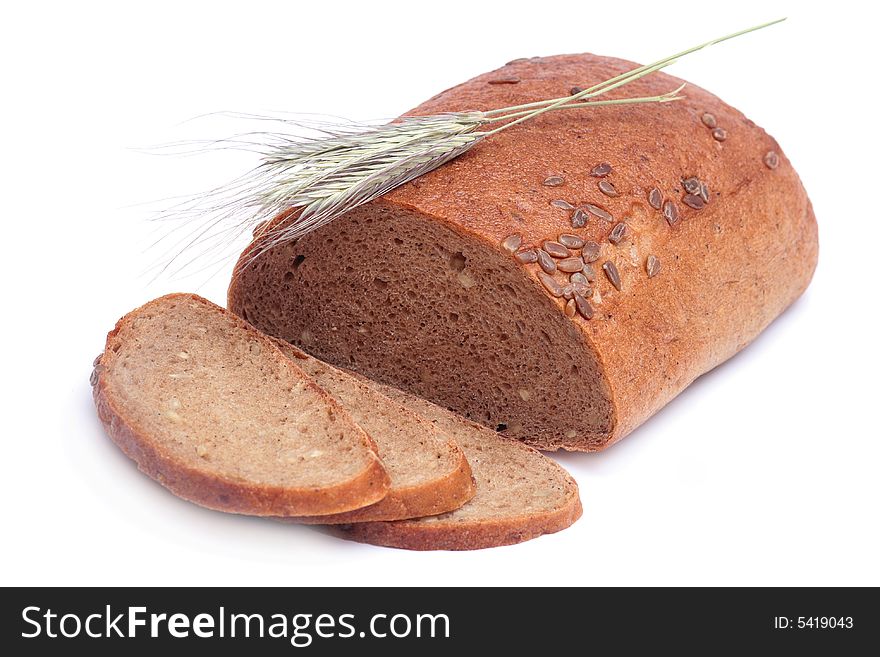 Bread isolated on white background with wheat ears. Bread isolated on white background with wheat ears.