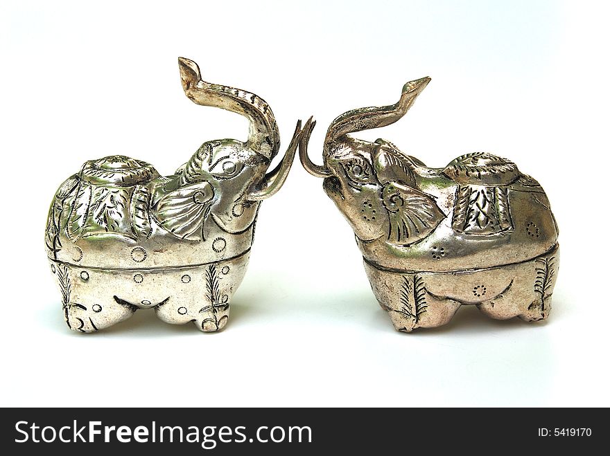 Handmade elephant silver boxes from Asia. Silver is a soft metal that has been used for many thousands of years by people all over the world, for jewelery, as money, and many other things. It is called a white metal even though it looks gray. The word silver is also used to talk about this colour or shade of gray.Silver is very malleable, and ductile, which means it can be pulled into wire or hammered into thin sheets. When it is used in money or in jewelery, it is often mixed with gold or some other metal to make it harder.