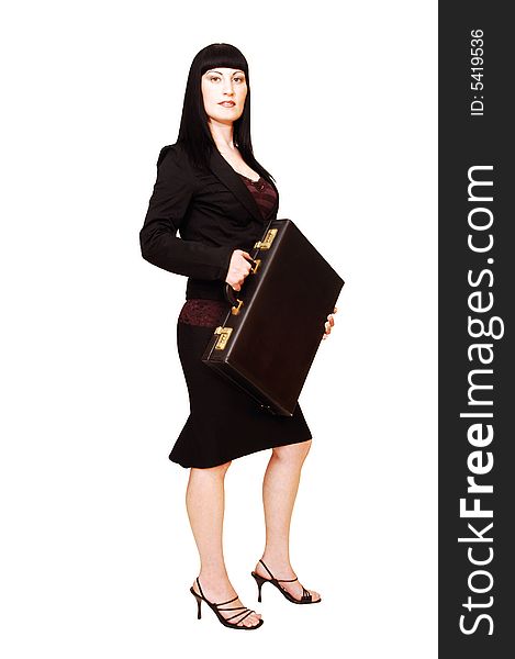 An serous looking businesswoman in a black suit and strait hair with the 
briefcase in her hand. An serous looking businesswoman in a black suit and strait hair with the 
briefcase in her hand.