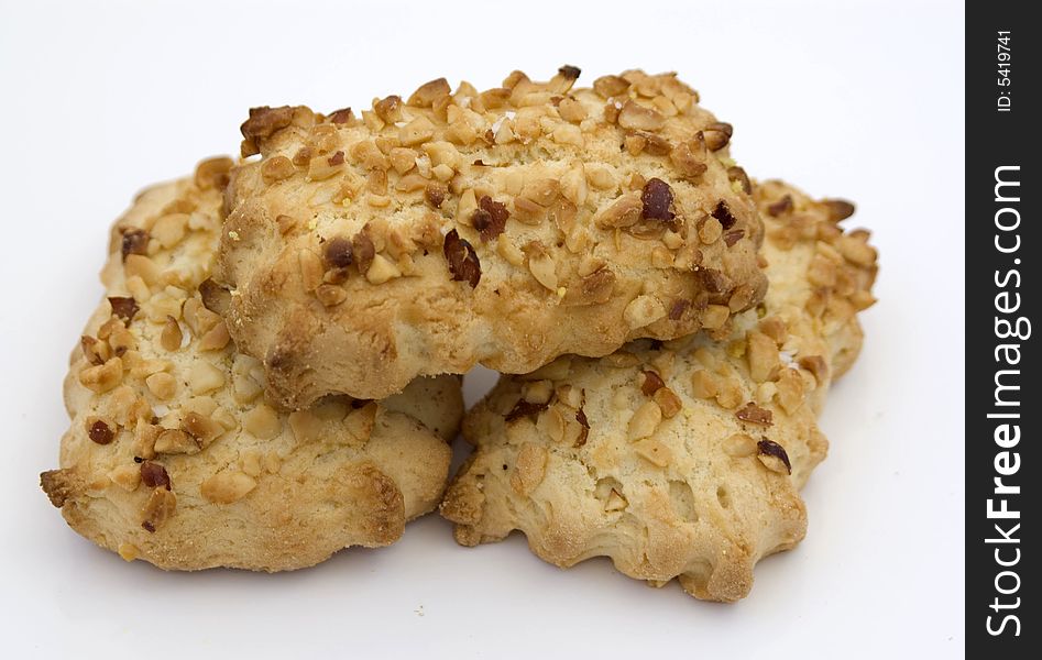 Tasty cookies with nutlets on a white background. Tasty cookies with nutlets on a white background