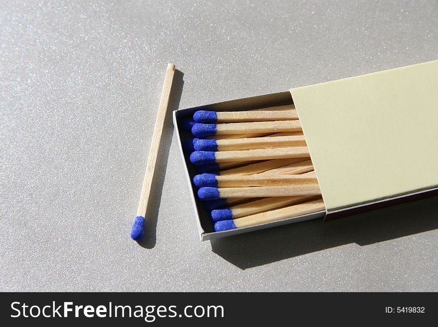 Boxes of matches and a match