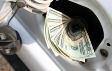 Money Down The Tank Stock Photo Money Down The Tank Stock Photo