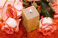Golden Candle With Roses Stock Photo