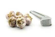 Raw Garlic And Garlic Press, Isolated Royalty Free Stock Image Raw Garlic And Garlic Press, Isolated Royalty Free Stock Image