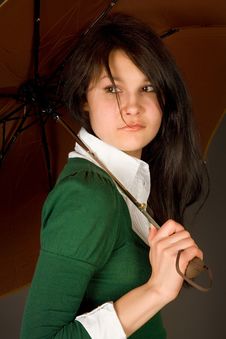 Serious Looking Girl Under Umbrella Stock Images Serious Looking Girl Under Umbrella Stock Images