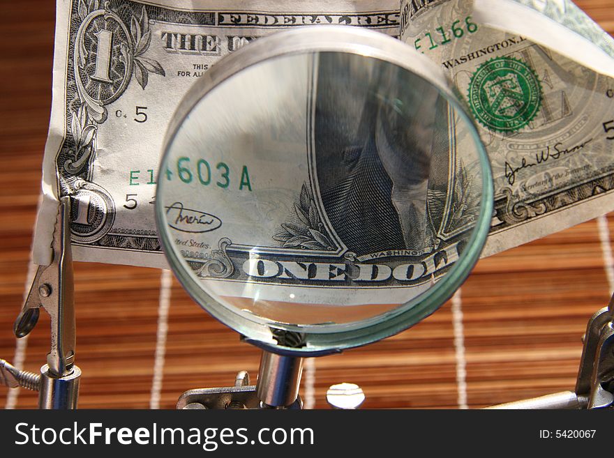 Increase a magnifier of dollar. Increase a magnifier of dollar
