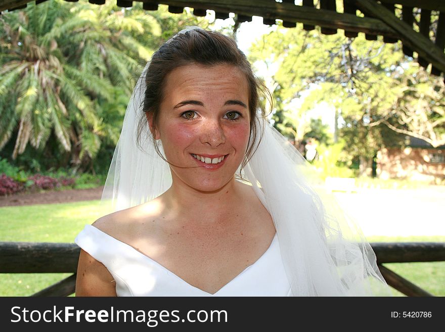 A beautiful white caucasian young bride with a surprised expression on her face. A beautiful white caucasian young bride with a surprised expression on her face