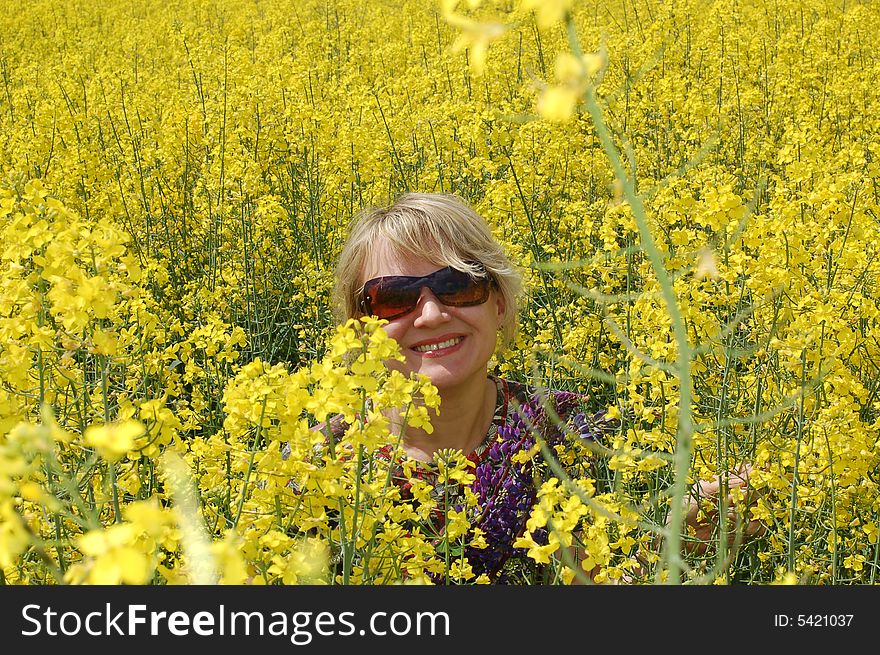 Beautiful woman on Yellow field. Beautiful woman on Yellow field