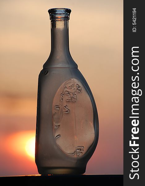 Bottle At Sunset