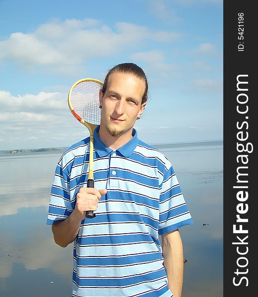 Boy With A Racket.