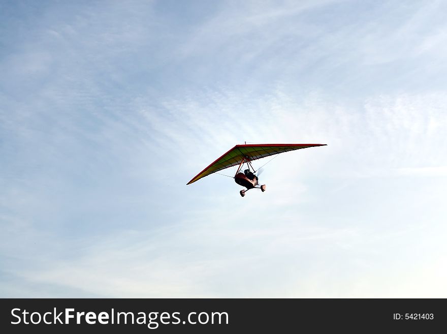 Ultra-light aeroplane on blue sky. Ultra-light aeroplane on blue sky