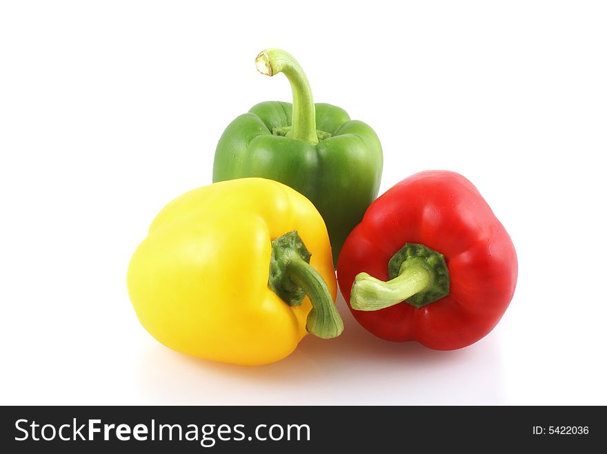 Three colors paprika isolated on a white background. Three colors paprika isolated on a white background.