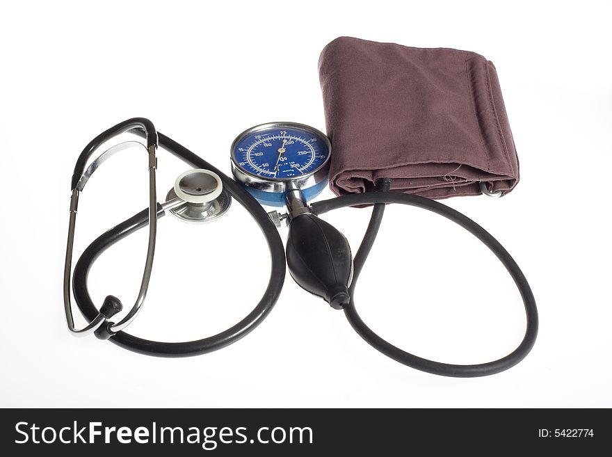 Medical manometer and stethoscope photo on white background