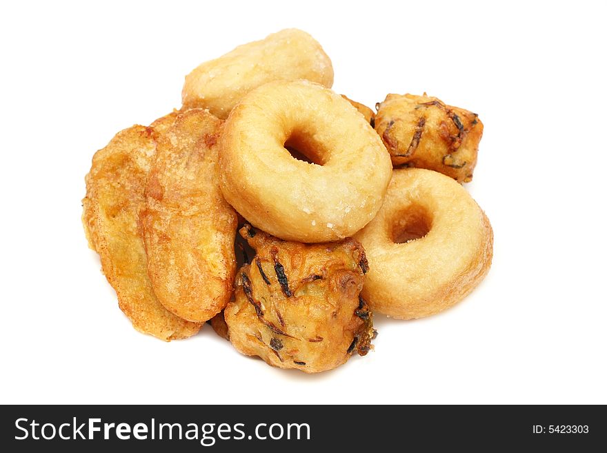 A pile of Malay cakes (prawn ball, fried banana and donuts) on white background.