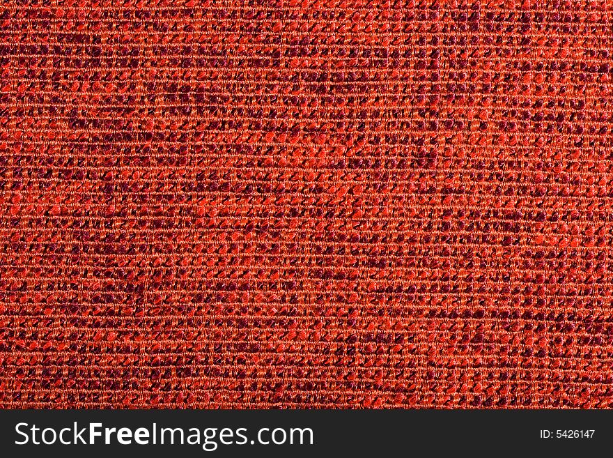 Qualitative red fabric texture. Abctract background. Close up.