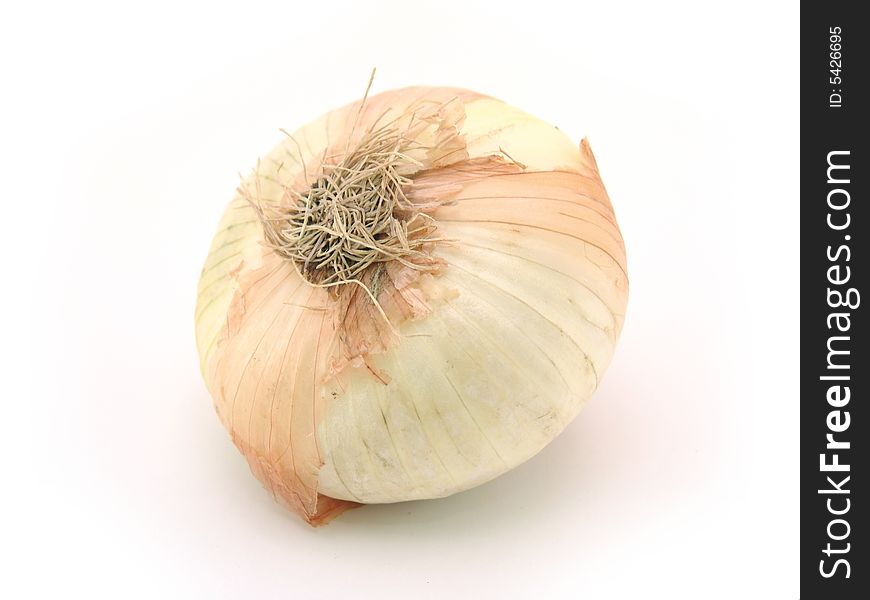 Single onion with skin partially off over white background