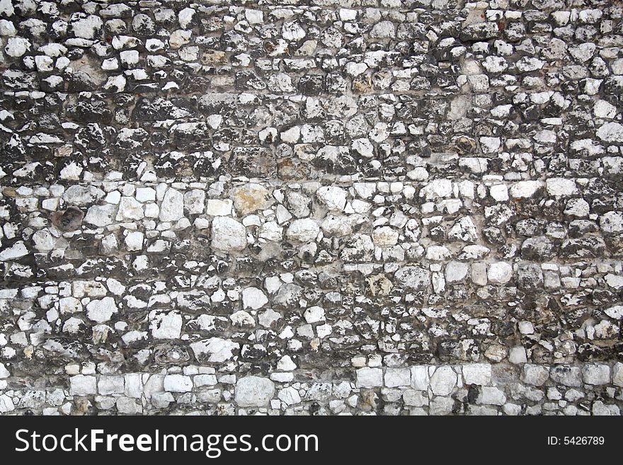 Fragment of stone wall surface