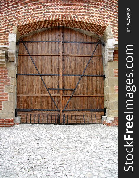 Old oak door with carved stone surround