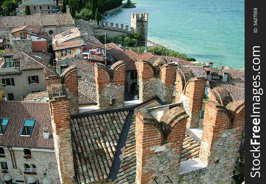 Medieval on a bank of lake, italy. Medieval on a bank of lake, italy