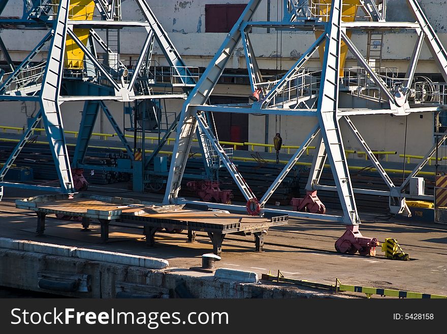 Transportation series: freight harbor crane on the berth