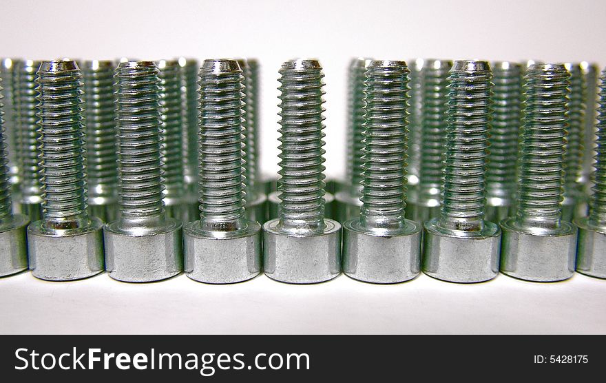 Vertical stand bolts in three lines. Vertical stand bolts in three lines