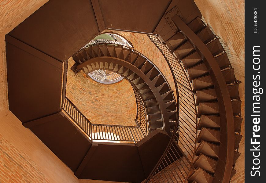 Spiral staircase in the bell tower in Verona, Italy
