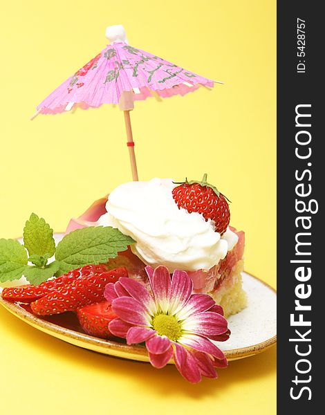 A slice of cake with strawberry for hot summer. A slice of cake with strawberry for hot summer