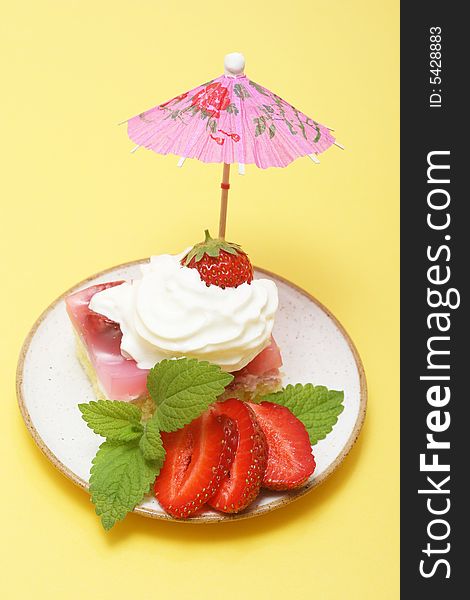 A slice of cake with strawberry for hot summer. A slice of cake with strawberry for hot summer