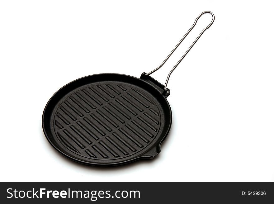 Pig-iron corrugated frying pan for a batch