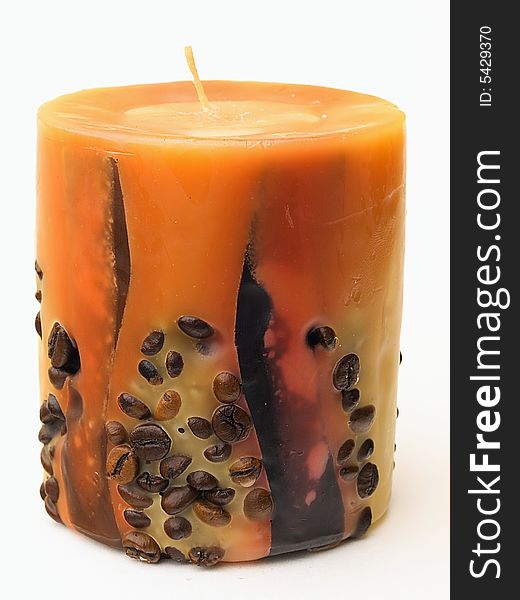 The handmade aromatic candle decorated by coffee grains. The handmade aromatic candle decorated by coffee grains