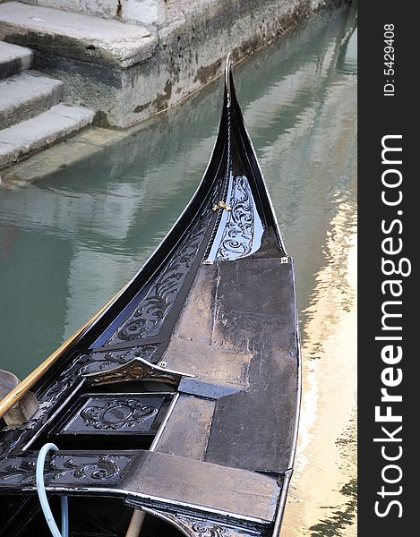 Front part of a gondola in Venice, Italy