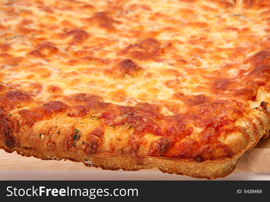 Fresh  baked cheese bread pizza and toppings. Green onion, bell peppers, green salsa, ranch dressing, chopped tomatoes.