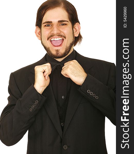 Happy young man wearing formal suit and holding bow tie. Happy young man wearing formal suit and holding bow tie