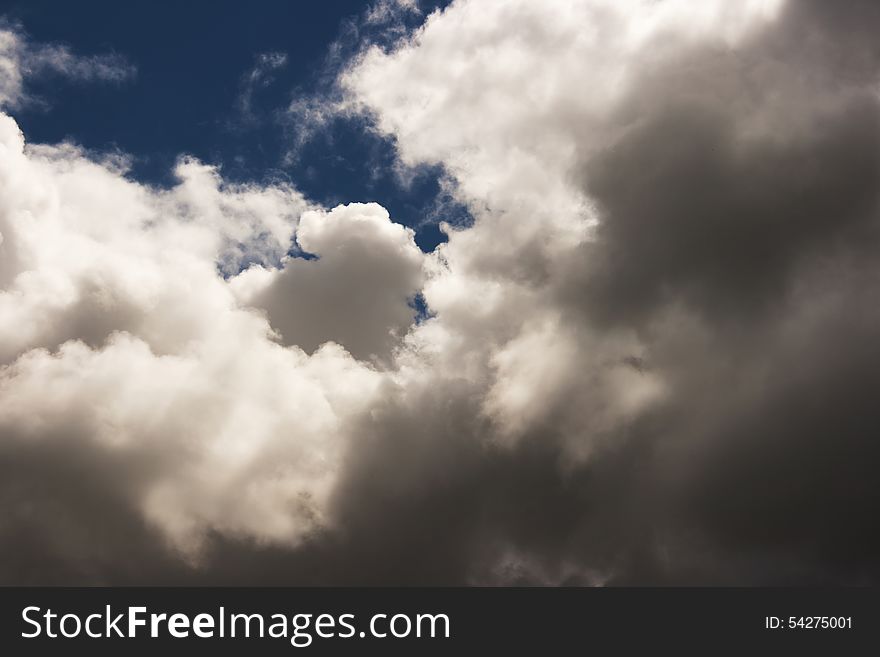 Thick white cloud in the blue sky