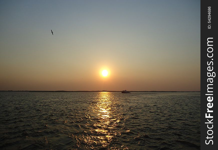 Riverboat on the vast expanse of the river. Riverboat on the vast expanse of the river.