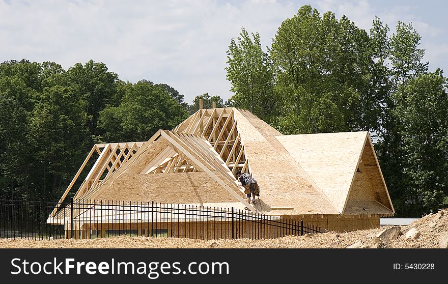 Man Working On Roof