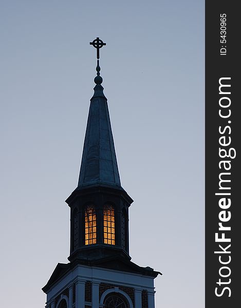 Church steeple in the evening sky. Church steeple in the evening sky.