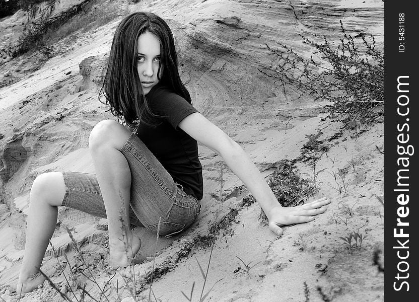 Portrait of the young woman on sand
black white. Portrait of the young woman on sand
black white