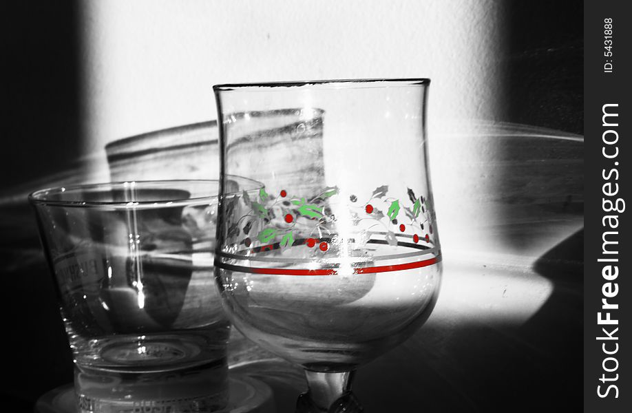 Two GLasses with their reflection and shadows. Two GLasses with their reflection and shadows.