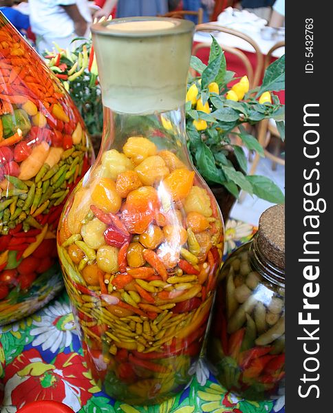 Hot peppers adorning a colourful table.