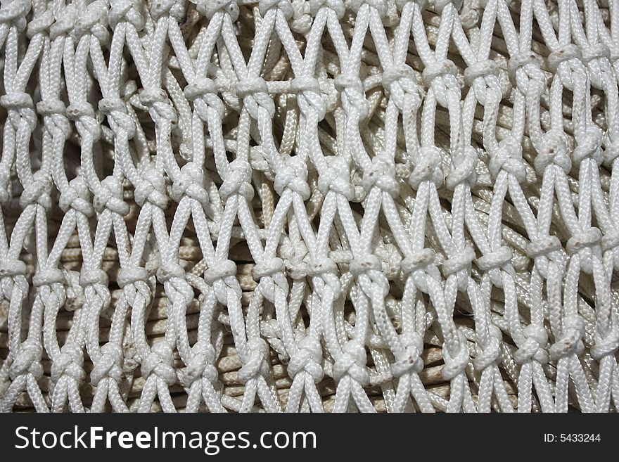 White fishing net, perfect for designs or backgrounds. White fishing net, perfect for designs or backgrounds