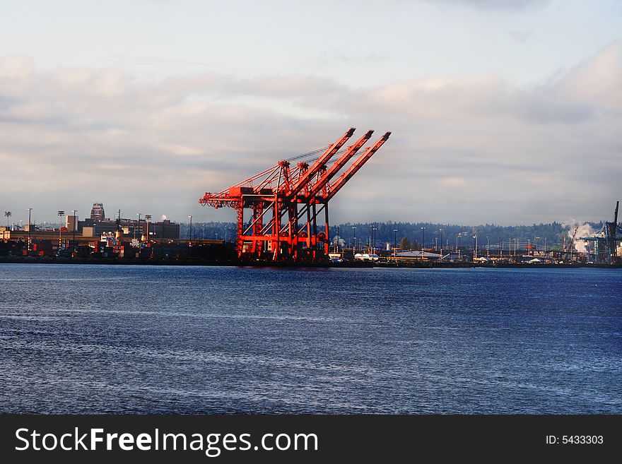 Port of Seattle v2 captures large container cranes located along the shores of Puget Sound at Seattle Washington. The skyline is set against a typical weather day for the region.