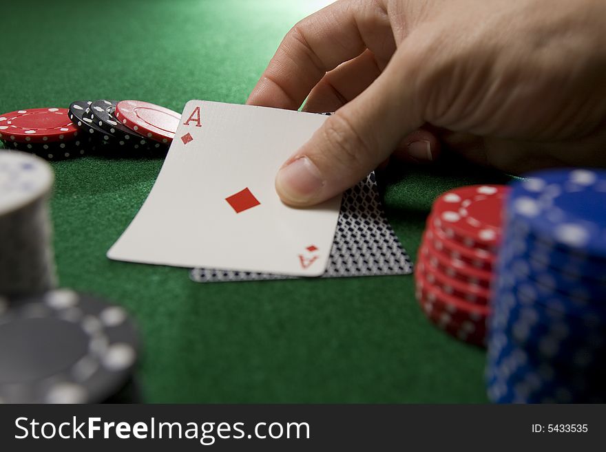 Blackjack hand with ace of diamonds surrounded by stacks of chips. Blackjack hand with ace of diamonds surrounded by stacks of chips.