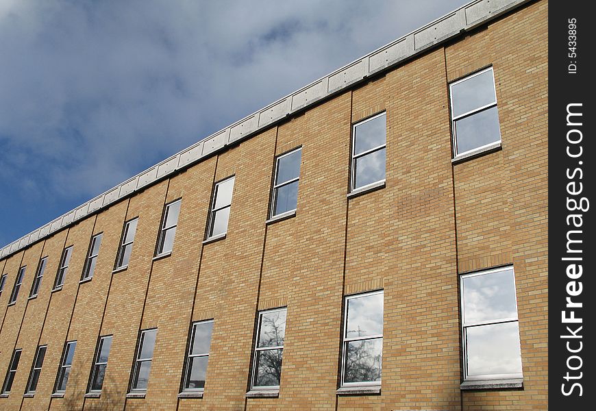 Brown brick building with sky