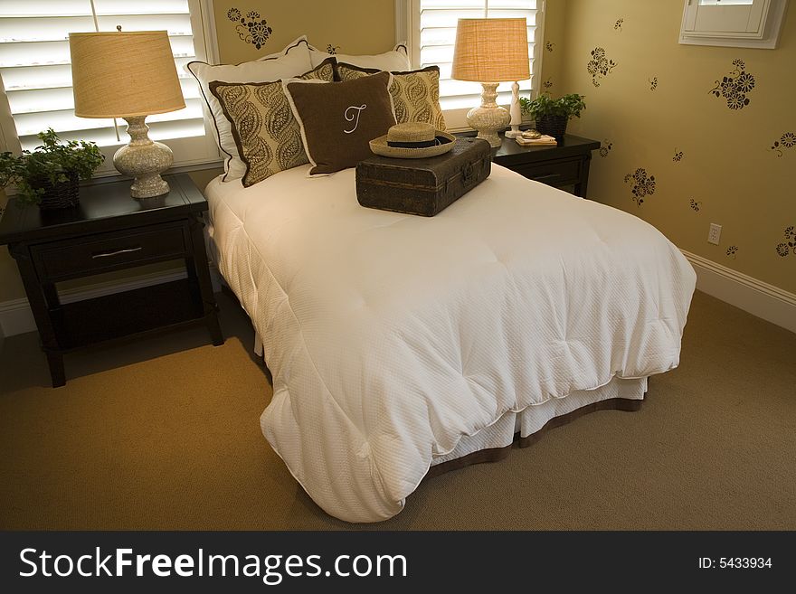 Luxury home bedroom with stylish furniture and decor. Luxury home bedroom with stylish furniture and decor.